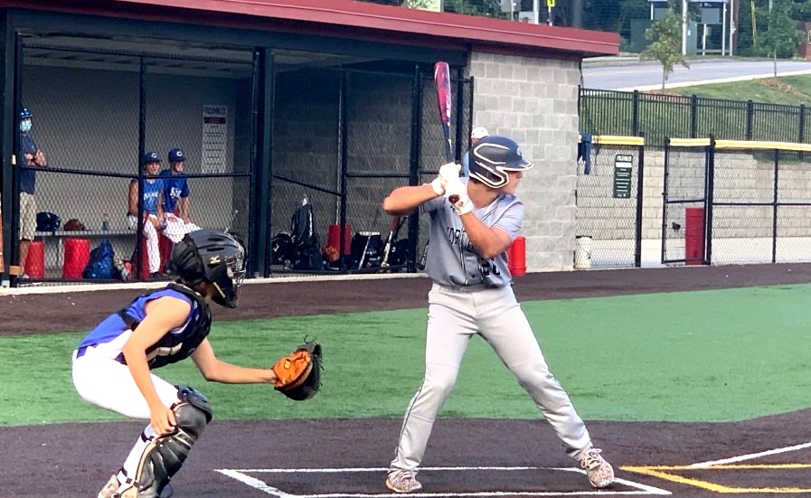 Off-Season Progress: Sophomore catcher Mason Ramos -- here taking some swings at the plate -- is part of a cohort of Warrior baseball players getting helpful playing time during intense fall league play.  
