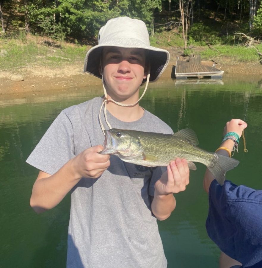 Fishing Fanatic: Sophomore Jackson Flores shows off his fresh catch.