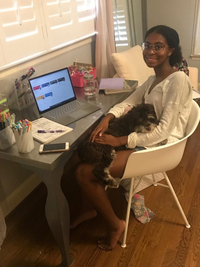 “I like to do school in my bedroom, and sometimes my dog joins me,” said sophomore Lena Hoover. “Having my own workspace really helps me concentrate on learning.” 