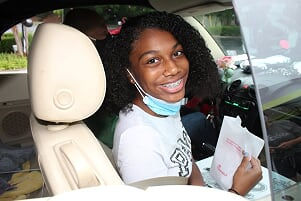 Moving Event: The pandemic has meant a final school year like no other for members of the Class of 2021 but nothing will diminish the indomitable spirit of this special senior class. Amara Suarez was one of many showing 2021 pride at the Aug. 21 senior drive-by event held at the Northside United Methodist Church.