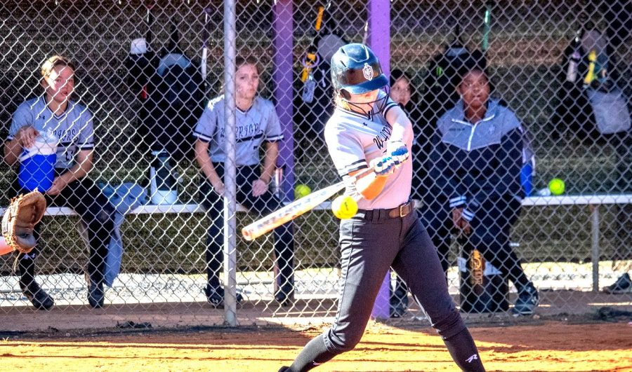 Softball Slammer: Sophomore Cece Smith is poised to hit that ball right out of the park.