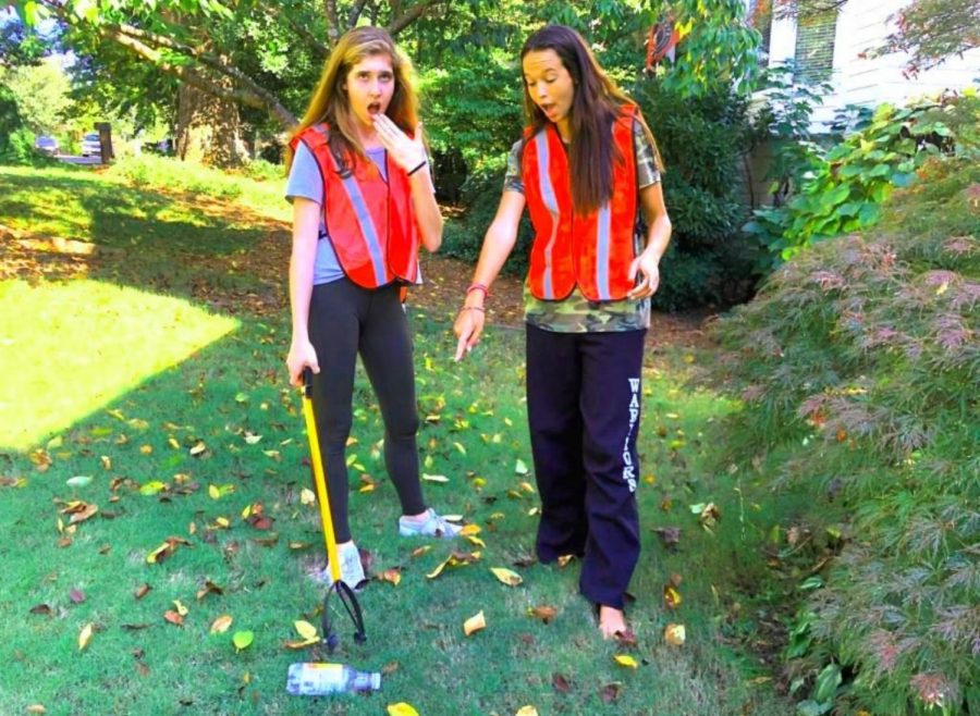 Earth Day Is Everyday: Seniors Caitlin Hohenstein (left) and Caitlin Krachon (right) are hard at work cleaning up their community.