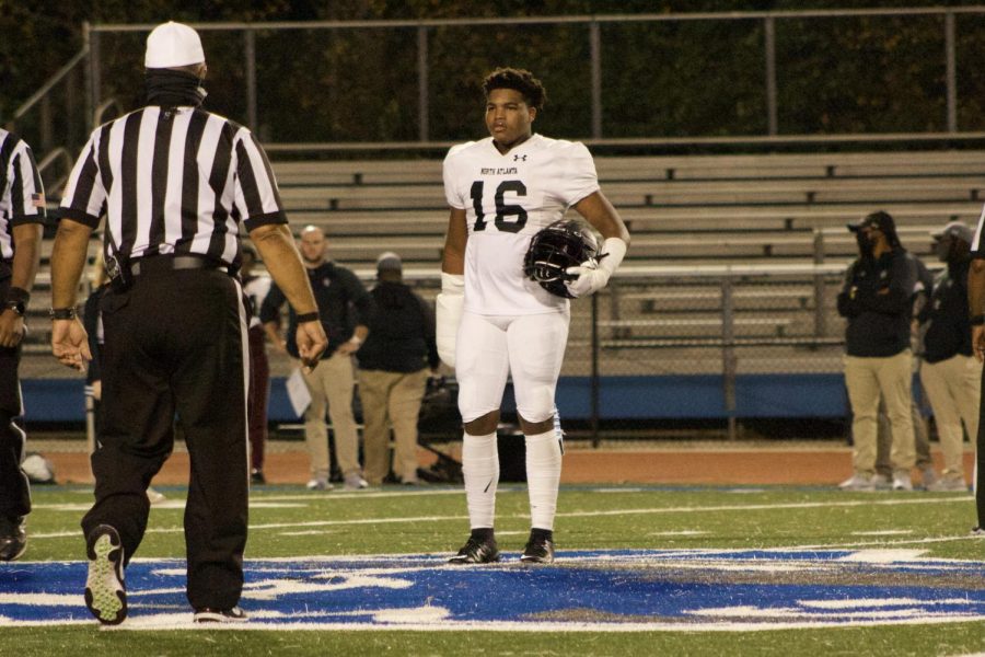  Senior Armari Hodges takes the field as Game Captain overseeing the coin toss. A two-year starter and three-year varsity player, Hodges says he just feels blessed to be on the field during this time of COVID, “I feel honored to represent my team, and it touches my heart that my coaches and teammates trust me. That’s what it’s all about.”