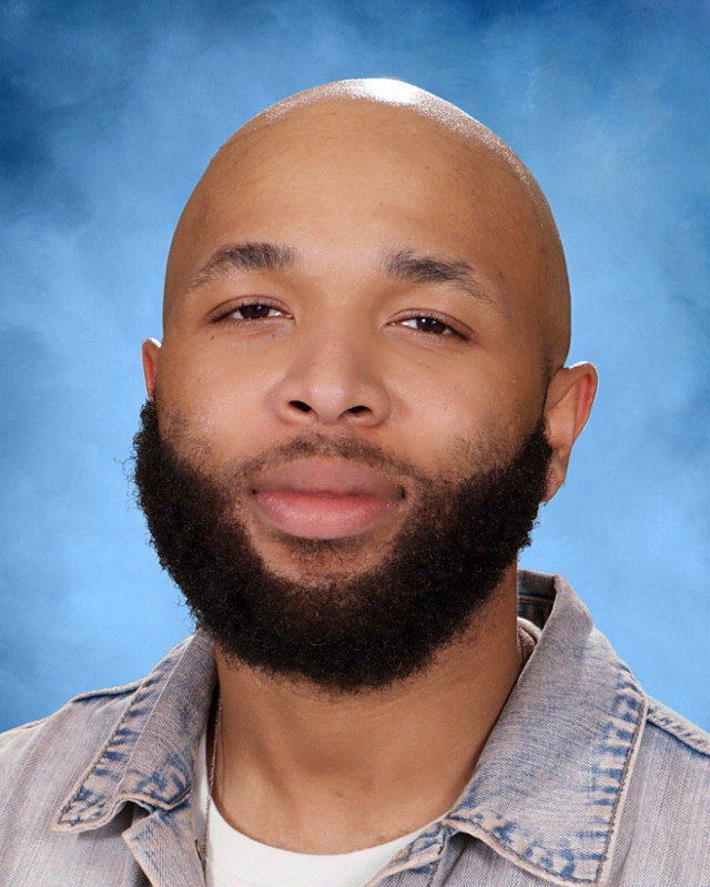 Educator of Excellence: Shown above is English-Language Arts teacher D’Andra McPhail. McPhail  is dedicated to the success of his students and embodies what it means to be apart of the Dubs community. 