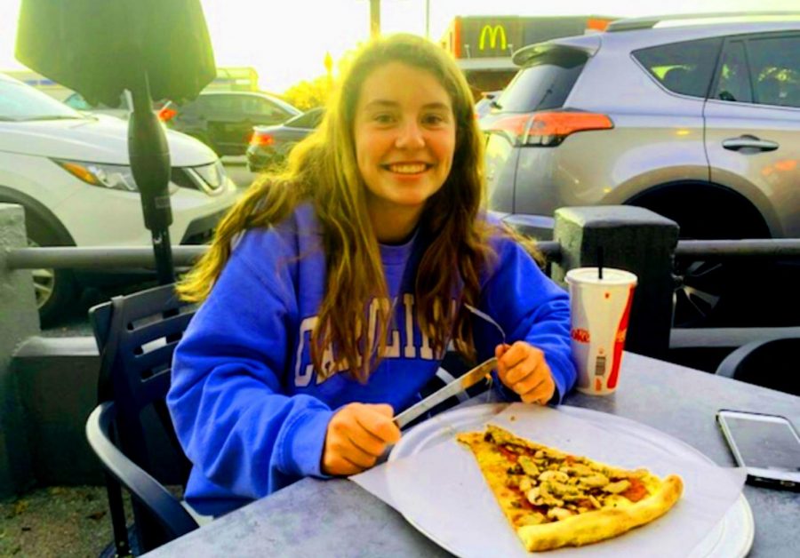 Dynamic Duo: Fellinis and La Fonda offer impressive and exciting dishes to the Atlanta area. Shown above is junior Josie Bird enjoying a nice slice of pizza on the Fellinis patio. 