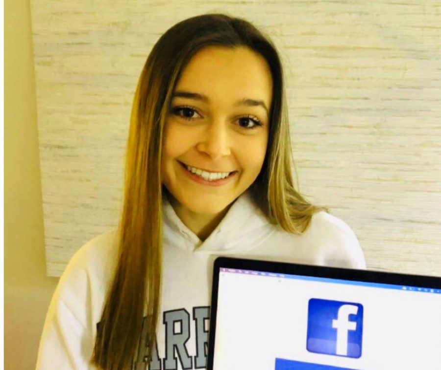 In or Out: The future of Facebook is debated by many young people today. While some find it outdated, many people all around the world, and in the Dub community, still value this iconic social media platform. Shown above is junior Mady Mertens.
