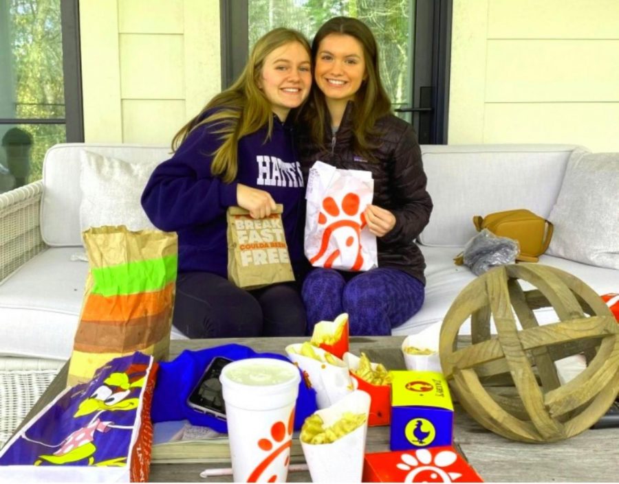 Fries Frenzy: Shown above are sophomore staff writers Caroline Edwards and Tanner Adams enjoying their variety of french fries that were vital to this investigation. 