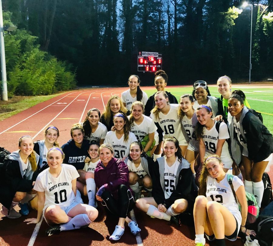 Pictured here is Coach Tara and her team after a hard-fought win last season. The team is incredibly thankful for all the hard work they know their coach puts into the season. 