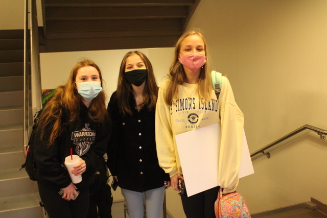 Stairwell Smiles: Juniors Danielle Dollar and Anna Yoder and freshman Jill Yoder make their way up the mighty 11 stories once again.