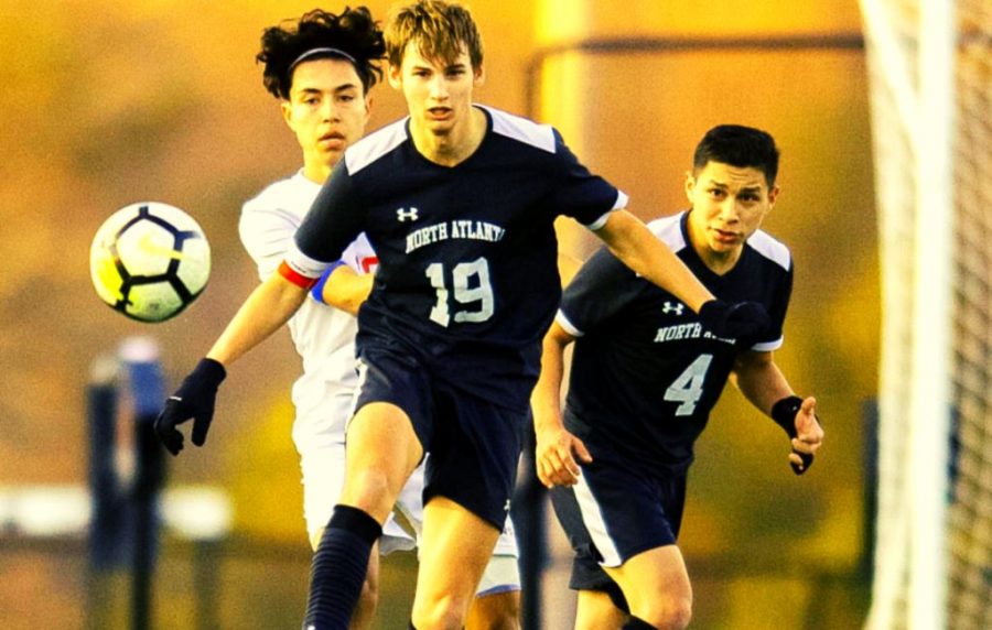 Team Leader: Senior midfielder Danny Gardner, a team captain, has led the North Atlanta team in scoring and has played his heart out for the region champs. Behind him on the pitch is junior wingback Michael Garcia.  

