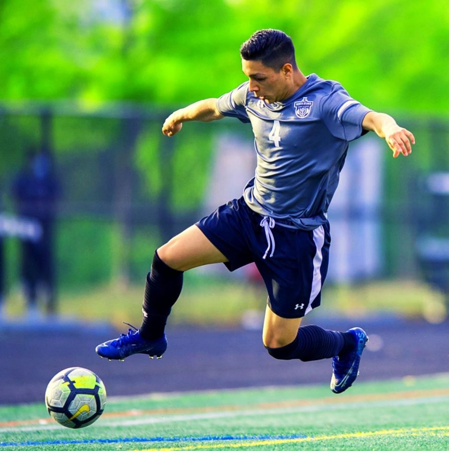 Tenacious Play: Sophomore defender Michael Garcia is tenacious at all times on the pitch. Here the skilled wingback makes a play for the ball in action against Northside in first-round playoff action. 
