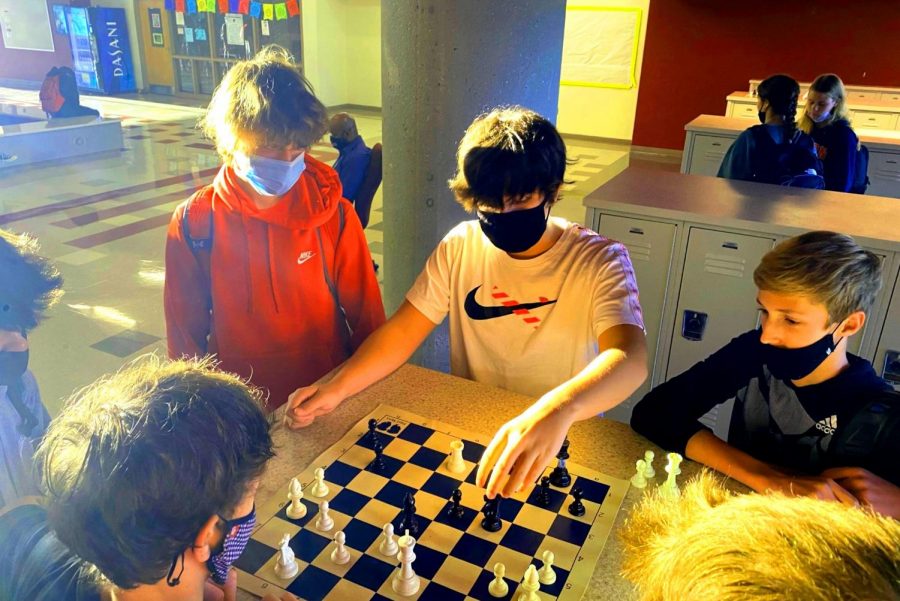 Sport of Kings: Freshmen Wyatt Welch, Jacob Weathington, Jack Shultz, Hunter Black are part of an early-morning group of chess players who match wits before first period. 