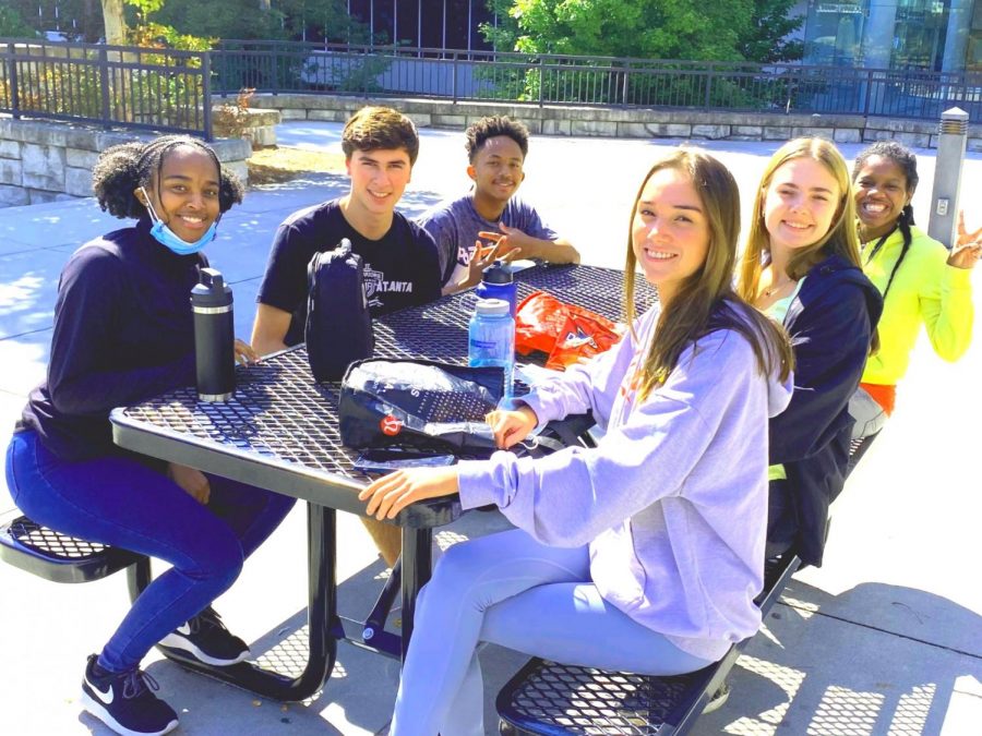 Delighted Dubs: Seniors Zoe Hall, Ava Tomlin, Kate Davis, Trinitii Baggett, Carl Alexander, and Curran Mitra know well of the benefits of their senior privileges, including daily outside lunch.