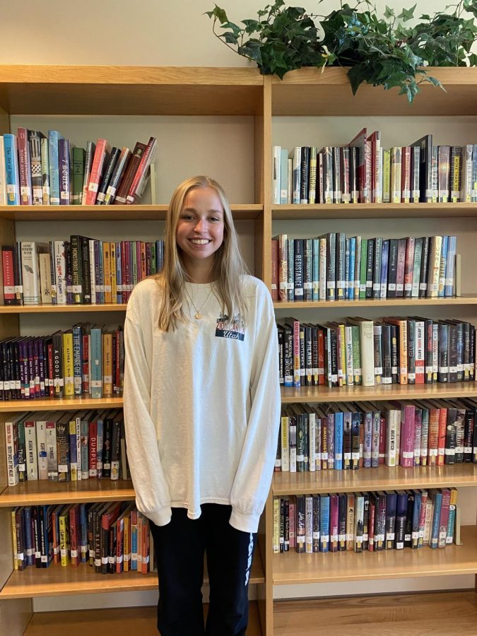 Heavenly+Hideaways%3A+Senior+Anna+Yoder+has+worked+in+the+library+since+her+freshman+year%2C+finding+the+quiet+atmosphere+and+resources+useful+for+studying.+