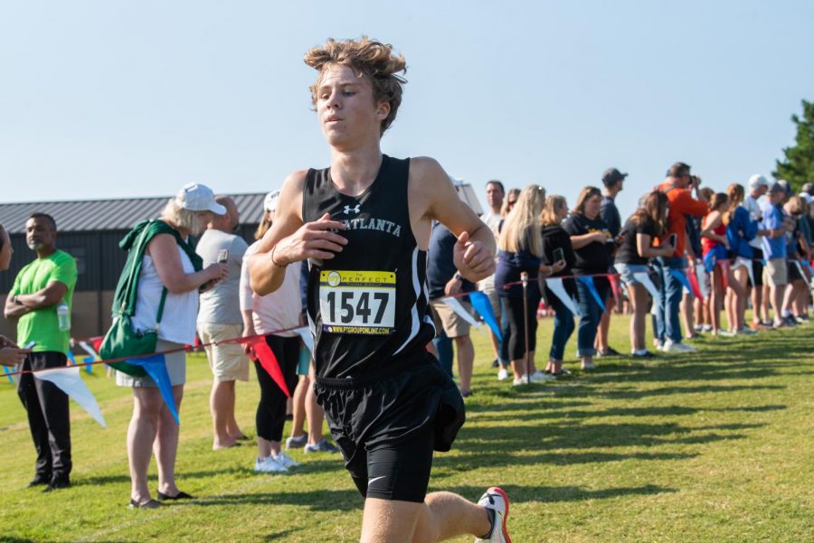 Dominating Dub: Junior Sumner Kirsch is making his run for glory -- and school records -- as the top runner on the region-leading boys cross country team. 
