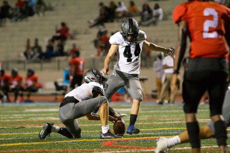 Locked in: Senior kicker Taft Meredith drills extra point 