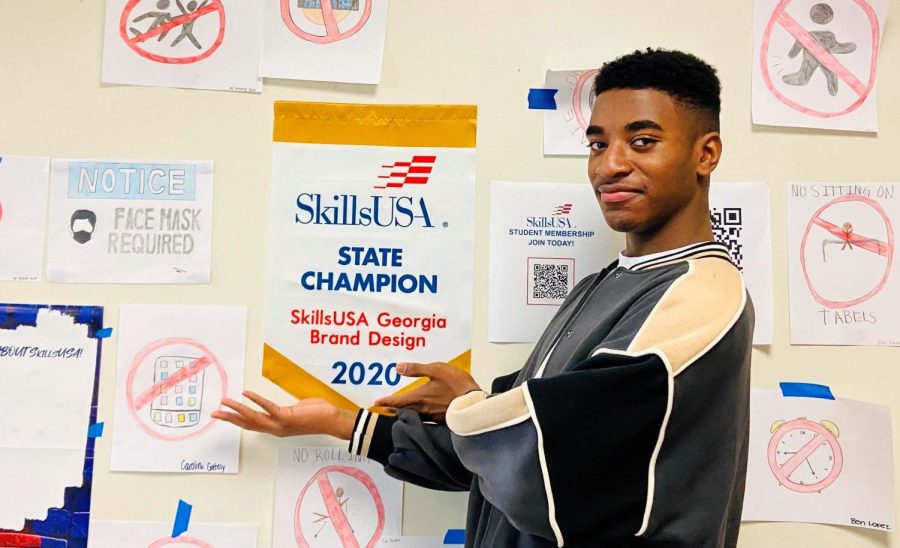National Success: SkillsUSA member and senior Calen Pitts is excited for this year’s State Conference where he aims to bring another Championship to the Graphic Design Pathway.
