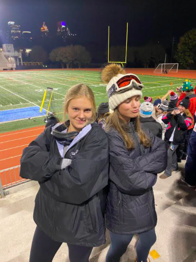 Hitting the Slopes (or stands): Juniors Tanner Adams and Caroline Edwards pose in their Ski theme attire at a Dubs game. The duo elaborates on this theme and more in this comprehensive ranking of all the best football themes.