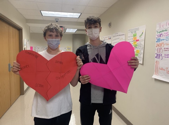 Love is in the air: Valentine's Day at NAHS is no small affair. Sophomores Keller Martin and Thomas Maiellaro show off their big hearts for the special day.