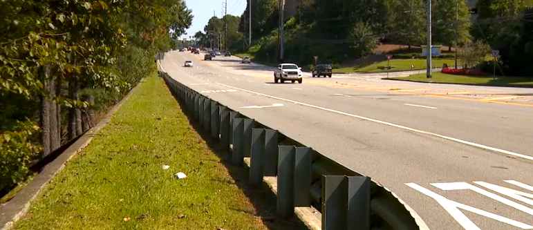 Sidewalks for Safety: Recent protests call for the development of sidewalks along Northside Pkwy. to promote safety for students walking and waiting by the bus stops.