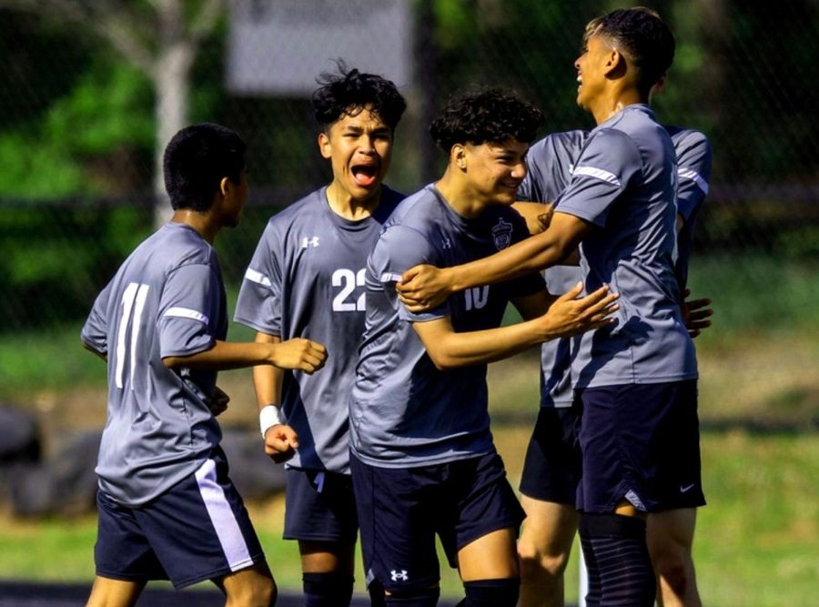 Dubs for Dubs: The 2021 sports year has been one of many highlights across many Warriors sports teams. Sportswriter Henry Peck took on the daunting task of ranking these events. On April 15, members of the Warrior boys soccer team mob team striker Jordin Chavez after he scores in the team’s 3-to-0 playoff victory over South Effingham. 