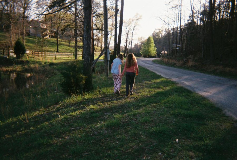 Photo Memories: Juniors Avery Braswell and Ellie Nejedly captured in a serene moment of friendship 