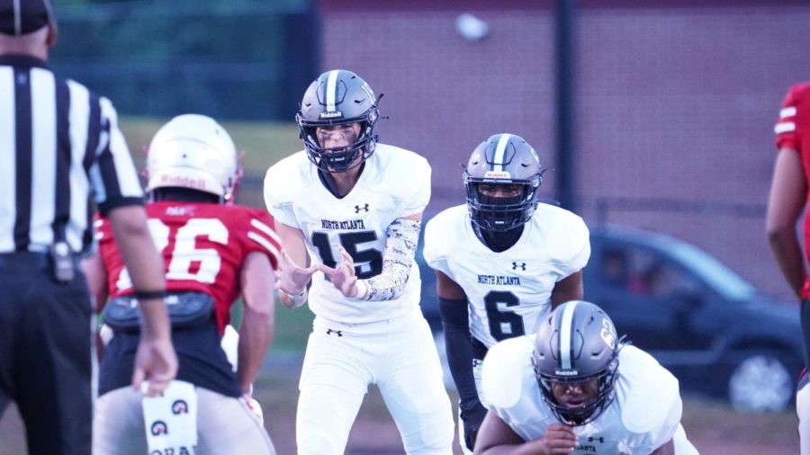 Reading the Defense: Sophomore quarterback Ian Reynolds prepares to take the snap.