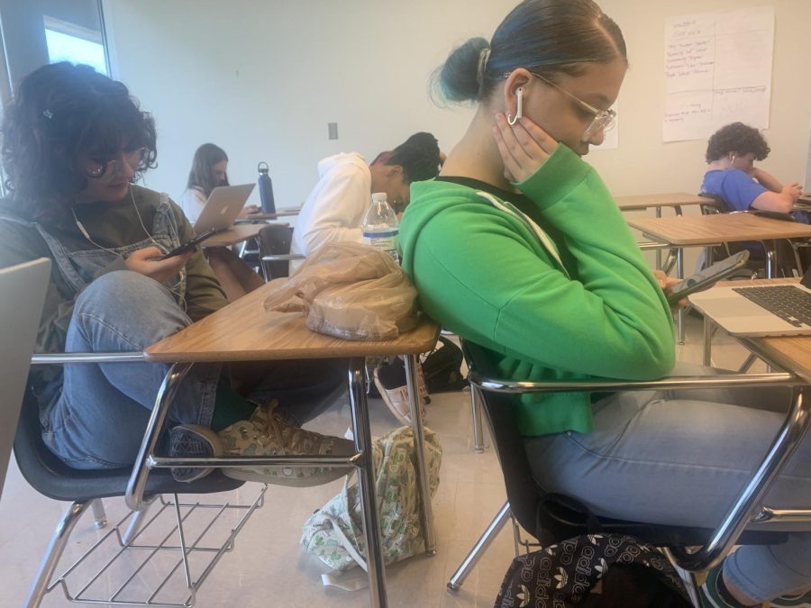 Cell phones and teachers go head-to-head in the battle for students attention in class.