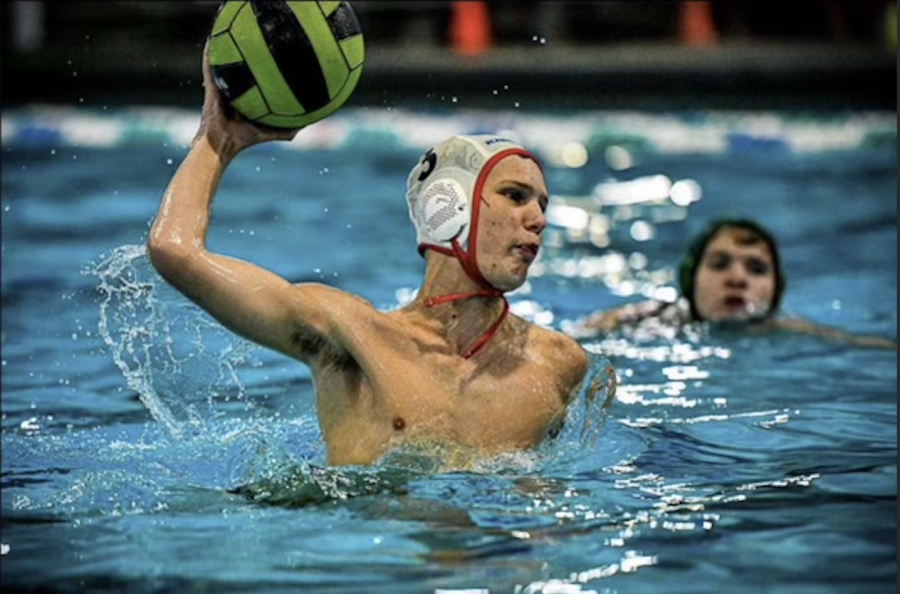 Head Above Water: Junior Thomas Maiellaro with a nifty finish at the net. 