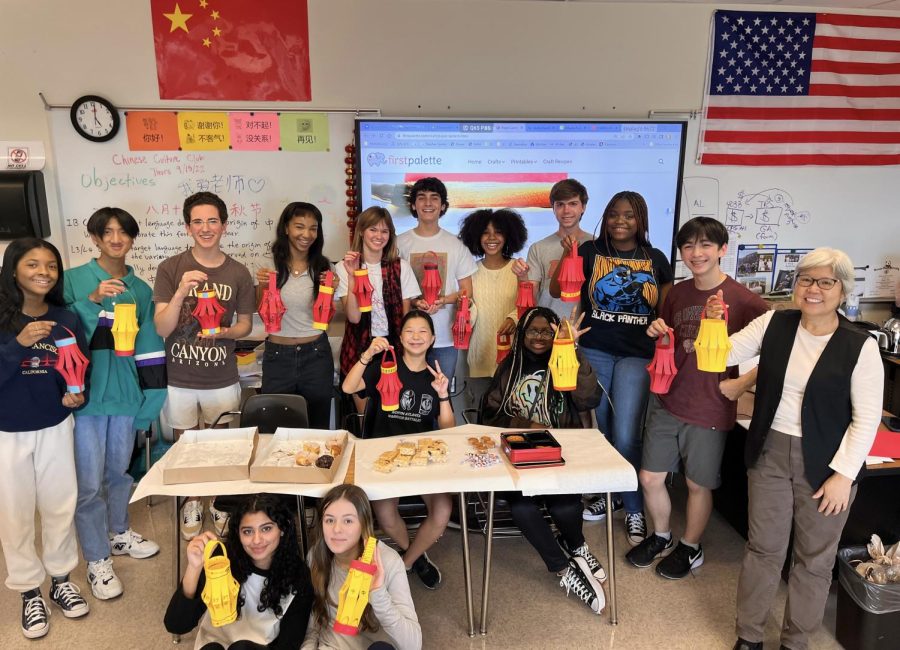 Feast Fest: Members of the Chinese Cultural Club try traditional Full-Moon Festival treats.
