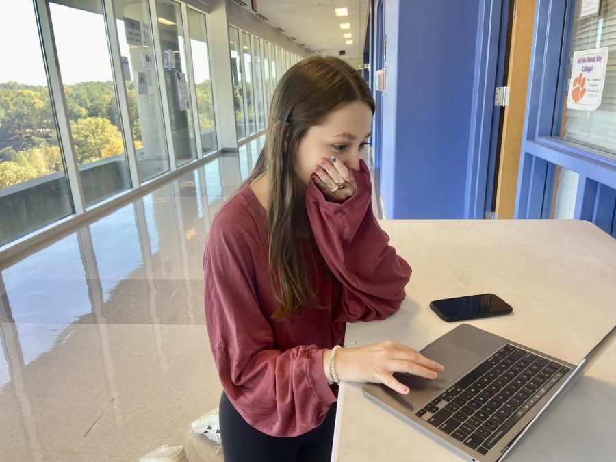 One of Many: Junior Grace Nyberg anxiously awaits her fate while her class ranking loads on her laptop.