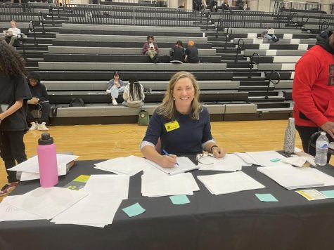College and Career Readiness: Volunteer College Counselor Laura O’Neill helps students gear up for the upcoming season of college applications and decisions.