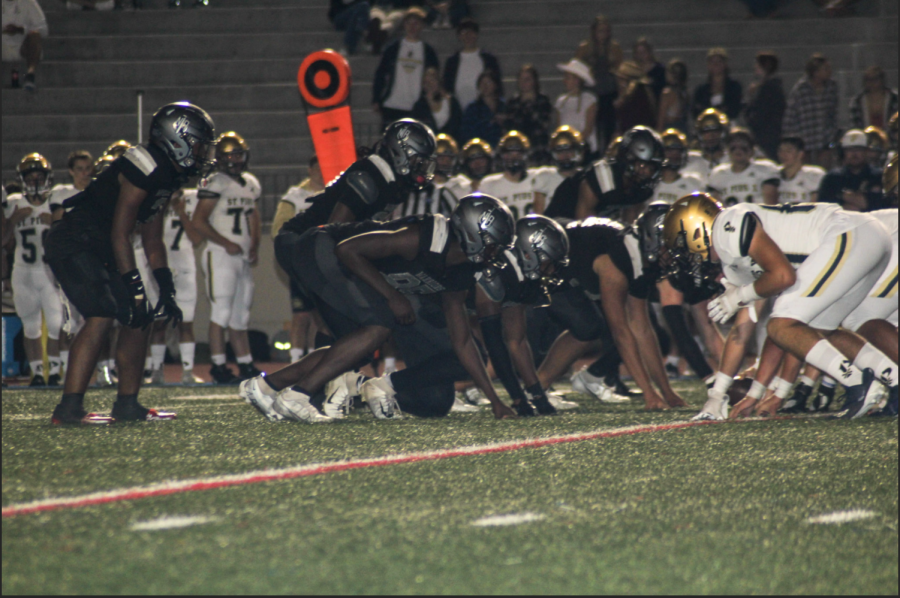 Doing the dirty work: The unsung heroes of North Atlanta football line up against their assignments. 