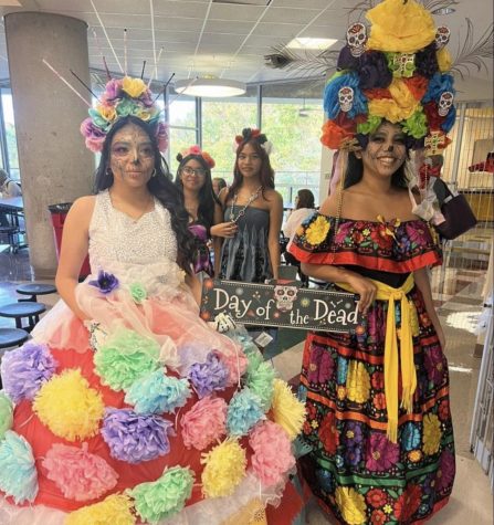 A parade through the cafeteria on November 1st celebrates the Day of the Dead.