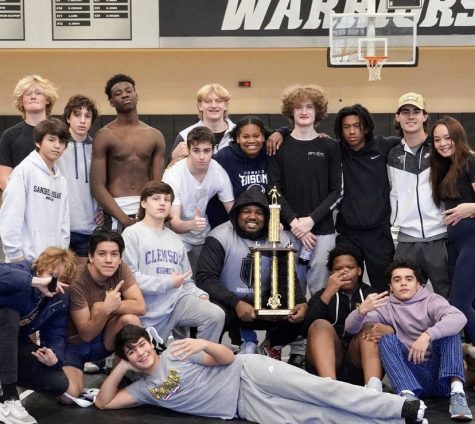 A True Team: Warrior Wrestlers celebrate their 21-22 region victory, and are eager to (once again!) dominate in their 22-23 season.