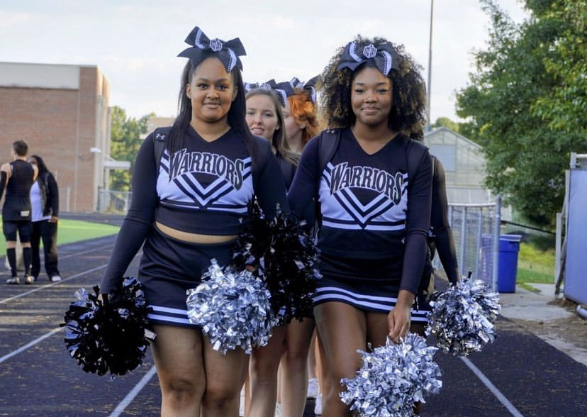 Leading the charge: The cheer squad is always looking to energize the crowd and the players. 