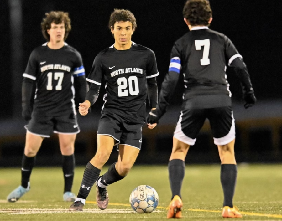 Sharing the Love: Dub Stars Brent Shannon, Anthony Forbes, and Diego Fonseca are all threats with the ball in their possession. 