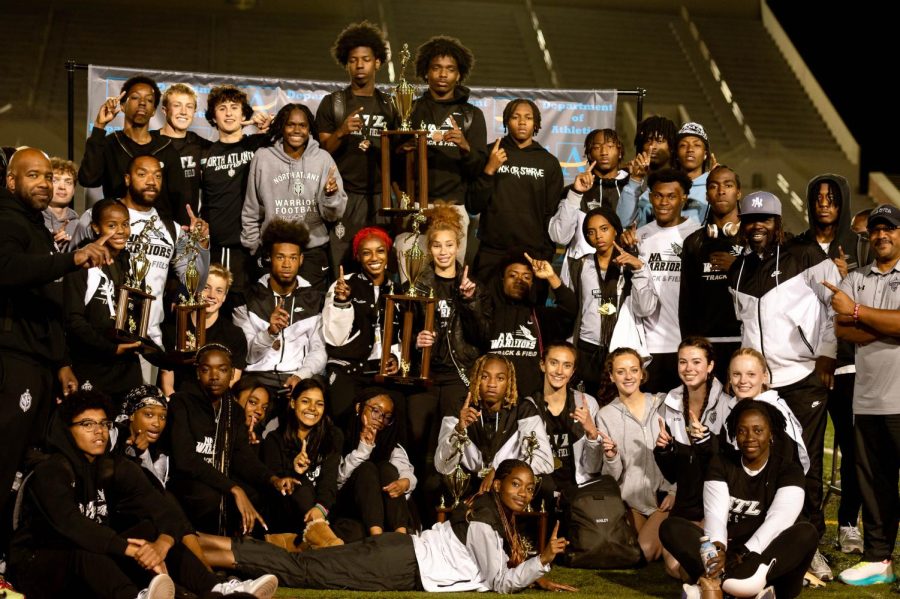 Track Stars: The entire team is all smiles after the North Atlanta Track and Field team clinched a second-consecutive Atlanta Public School meet championship at Lakewood Stadium across several competition days in late March. 