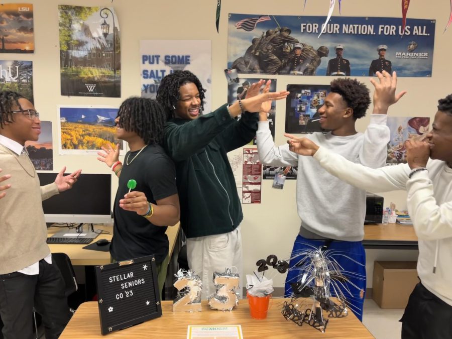 Friendly Farewells: Senior best friends congratulate each other on their post-highschool endeavors after working their way up the eleven stories in the past four years.