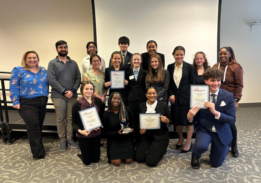 Legal Eagles: The North Atlanta Mock Trial team took first place in all categories at a competitive mock trial event on March 12 held at the State Bar of Georgia. Shown here are (first row)  Emily Holmer, Serrae Moore, Elizabeth Browman, and August Schmoll. Second Row: Annalise Yeagle, Claire Collins, Katherine Mason, Julia Promoff, Joi Gonzalez, Ellie Tavani and faculty adviser Chantel Lowe. Third Row: attorney coach Miriam Brossard, attorney coach Asad Ansari, Jordyn Hawk, Nathaniel Dyer and Eliana Nonami.  