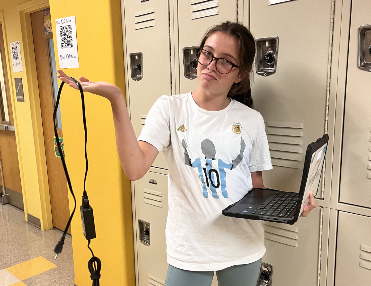 What%E2%80%99s+up+with+the+Chromebooks%3F+Delayed+distribution+sheds+light+on+technology%E2%80%99s+vital+role+in+education+and+how+access+disparities+affect+students.+Sophomore+Molly+Laing+is+one+of+the+lucky+NAHS+students+to+receive+her+Chromebook+in+the+first+distribution+batch.