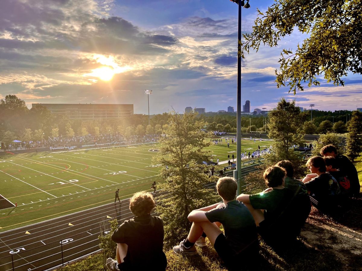 Freshmen+on+the+hill+watch+the+North+Atlanta+Warriors+defeat+the+Westminster+Wildcats+at+the+first+football+scrimmage+of+the+year.