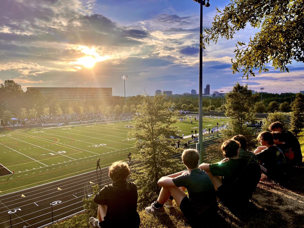 Freshmen on the hill watch the North Atlanta Warriors defeat the Westminster Wildcats at the first football scrimmage of the year.