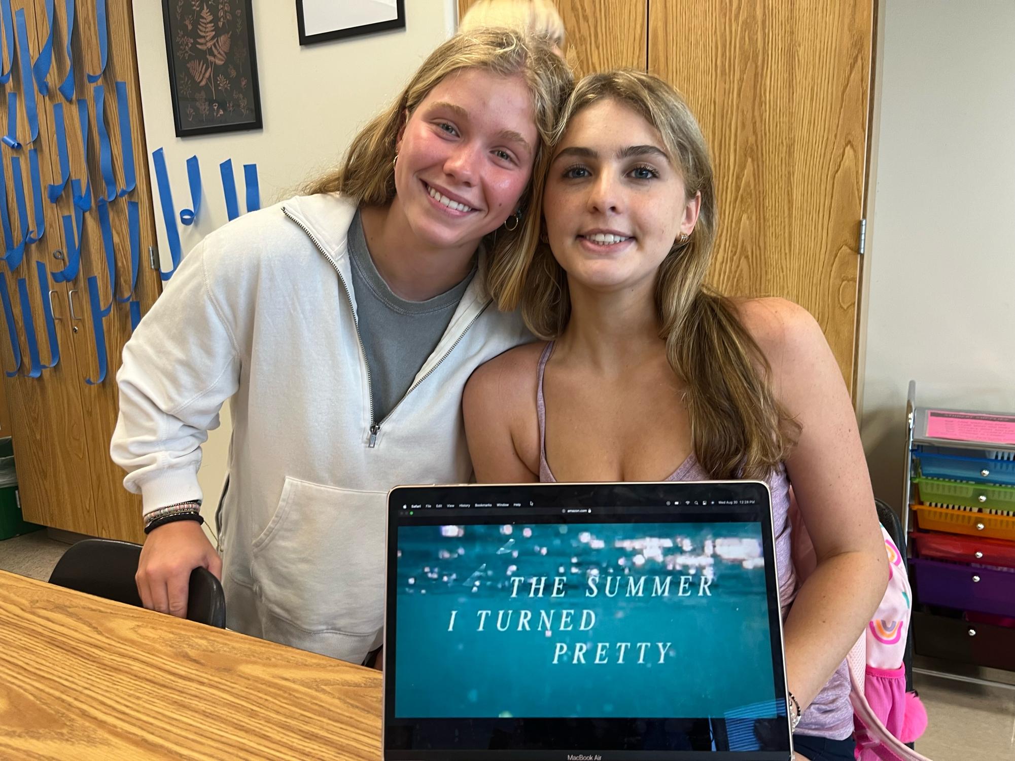 Tuned In: Seniors MayMay McWhirter and Lindsey Phillips stay up to date on team “bonrad” and team “jellyfish.”

