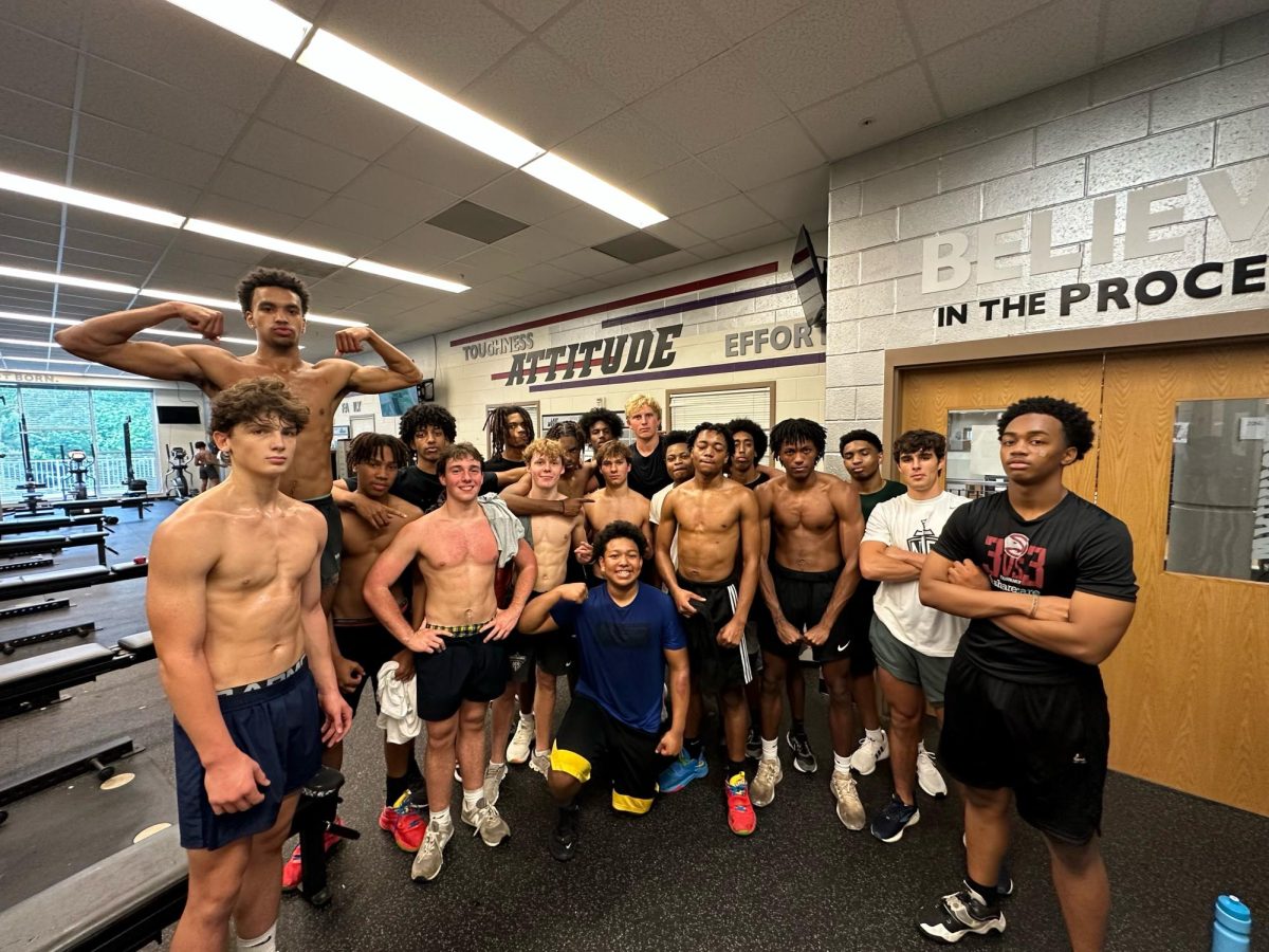 Basketball players pose after a tough workout led by Coach Grimes