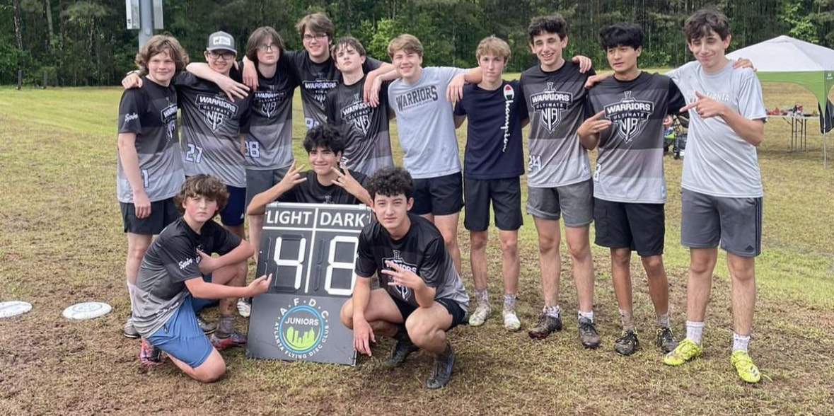 Ultimate Champions: The Warrior Frisbee team poses after a massive tournament win