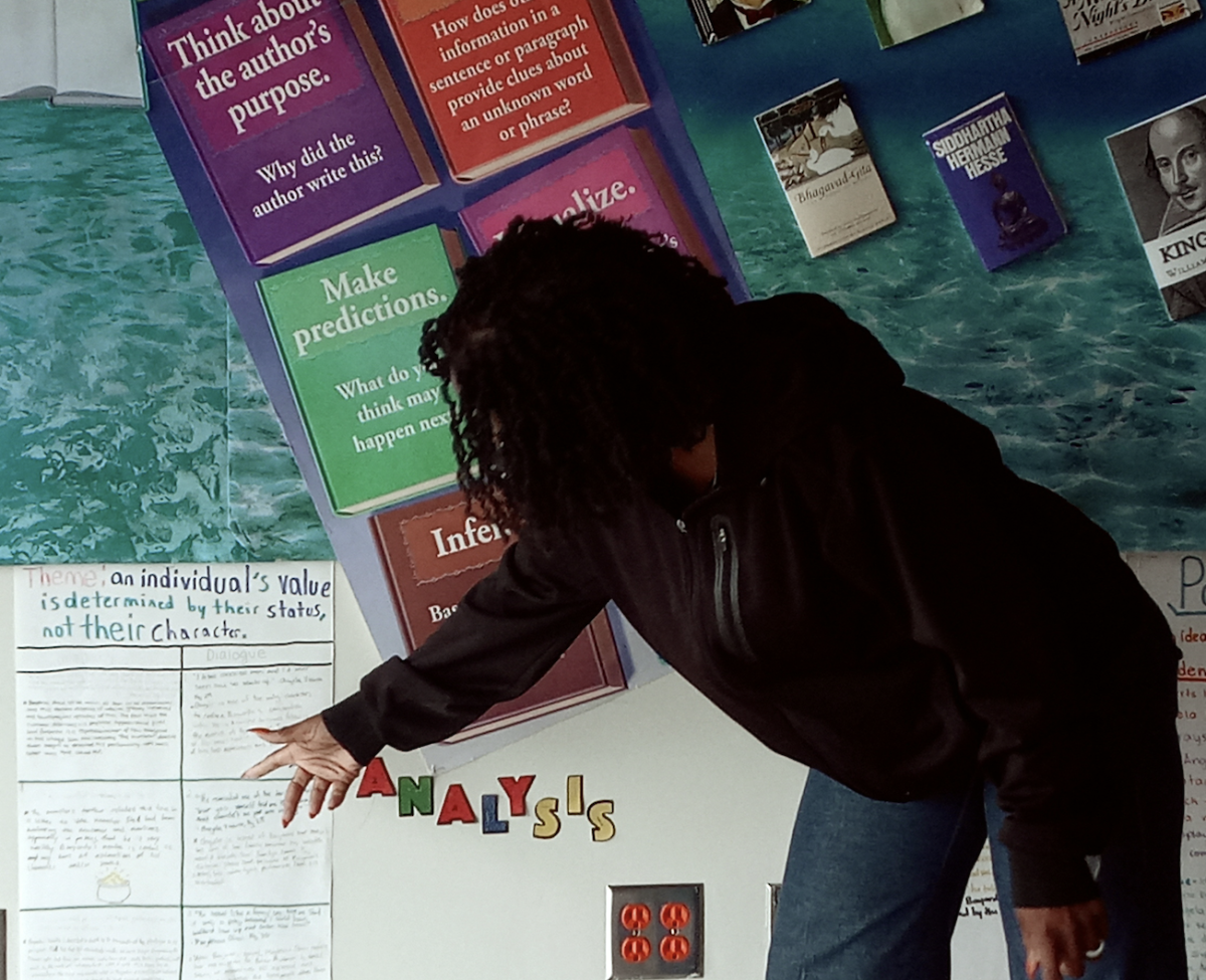 From FAMU to Teaching You: Dr. Mia Thompson shows off her students literature work.