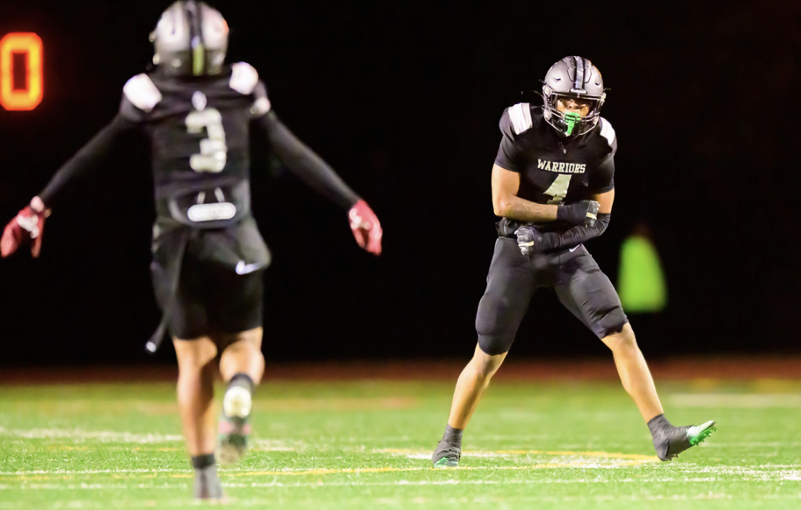 Dominating Defense: senior linebackers Da’lyn Caldwell and Xavier Ellison celebrate after a huge tackle.