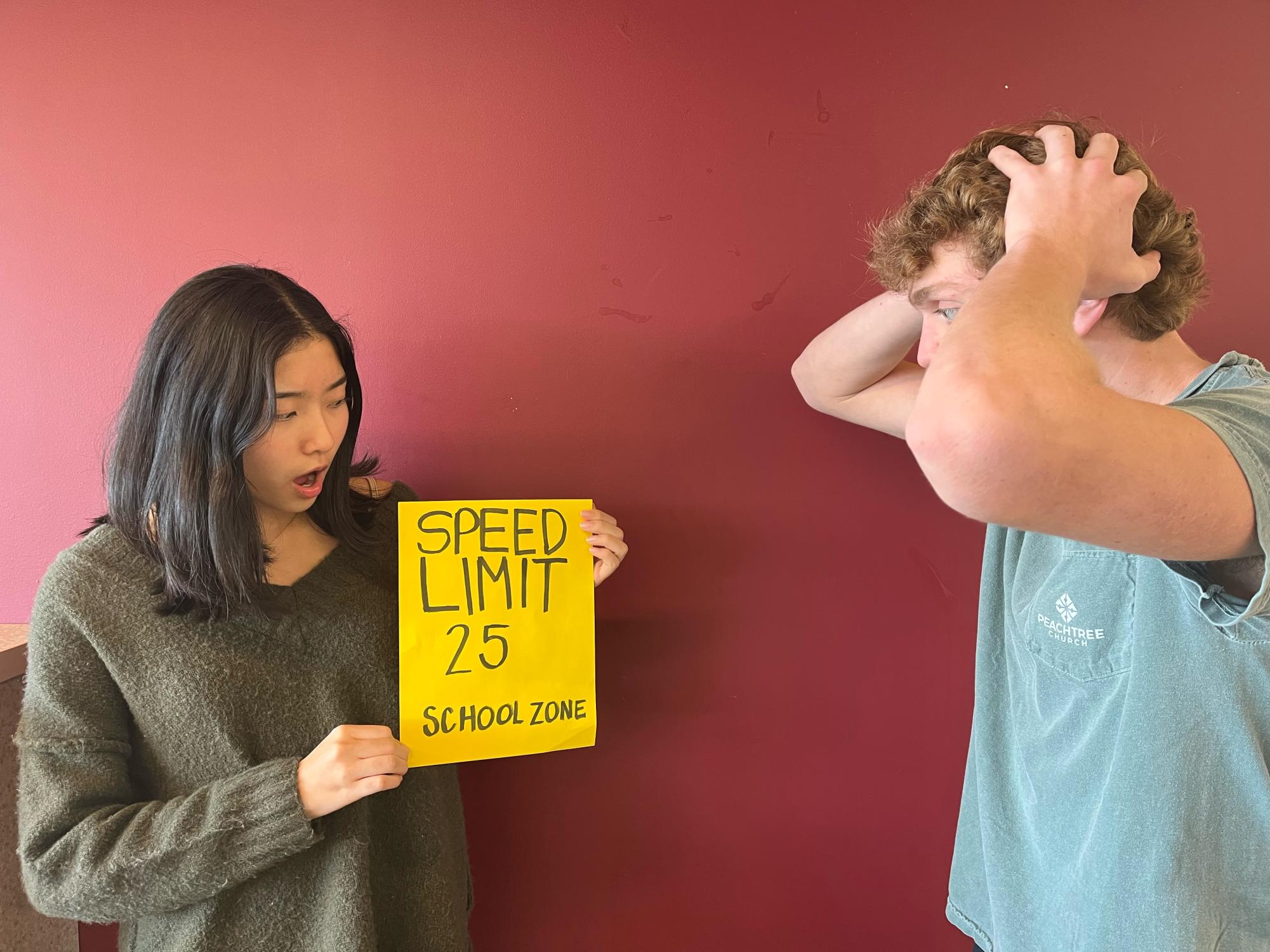 Super Speeders: Juniors Taylor So and David Hughes are surprised by the daunting new speed zones surrounding elementary schools.