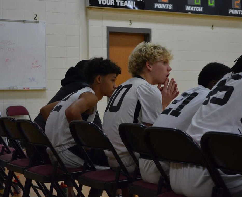 Ready for action: NAHS Freshman basketball players get ready to check into a game 